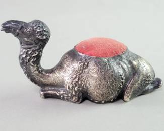 067  Lot 424  Sterling silver camel pin cushion