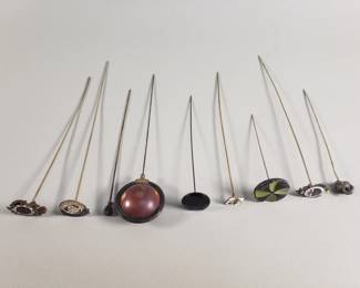 Lot 5  Collection of bronze, and enamel hat pins