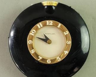 Lot 387  Art Deco Westclox Bakelite windup handbag clock