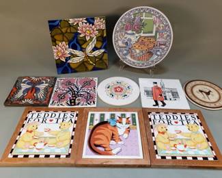 Lot 355  Group of vintage trivets and decorative tiles