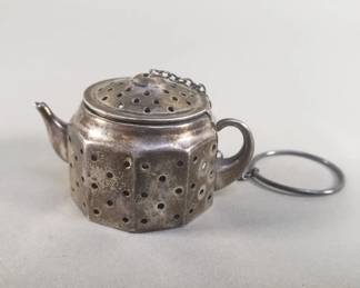 060  Lot 52  Antique sterling silver tea pot shaped mini tea