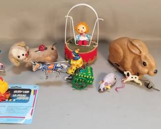 Lot 319  Group of vintage windup toys