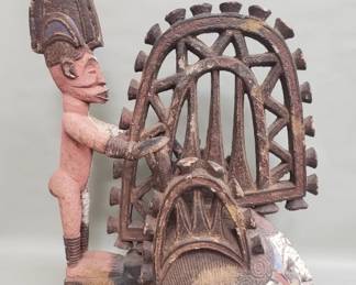 Lot 165  Igbo Agbogho Mmwo carved wood helmet mask
