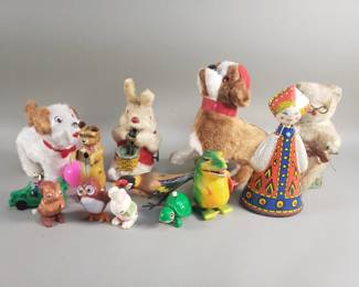 Lot 321  Group of vintage wind up toys