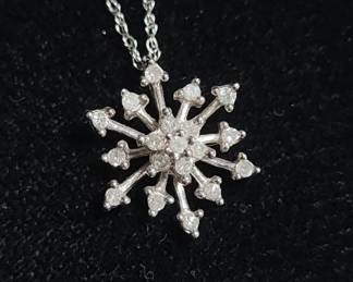031  Lot 288h  10k gold and diamond snowflake pendant