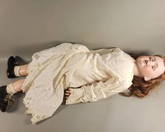 Lot 17  Antique JDK porcelain head doll