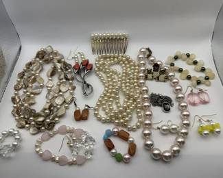 Lot 251h  Group of costume jewelry, convertible brooch