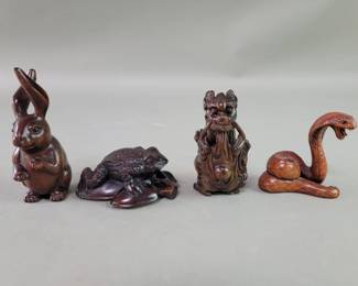 064  Lot 222  Four Japanese carved wood netsukes