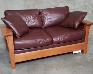 007  Lot 40  Stickley Arts and Crafts leather and oak sofa