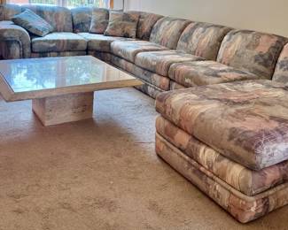 Stone table and sectional couch