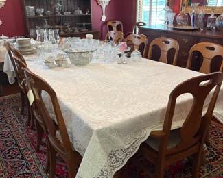 outstanding banquet table with 12  chairs, original to the house