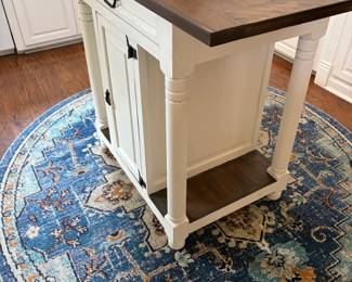 one of 3 matching rugs, kitchen island