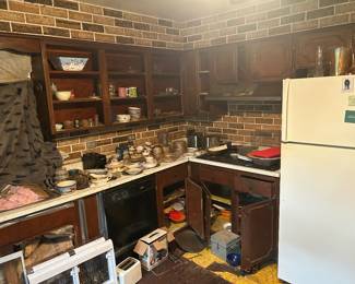 Tons of dusty stuff in cabinets