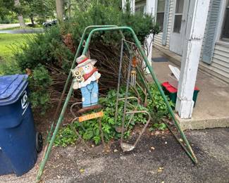 Old school swing set or planter stand perhaps