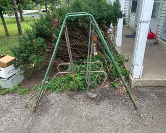 Old school swing, needs refurbishing or perhaps use for plants?