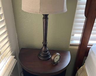 CLOSE UP OF 1/2 MOON TABLE AND TABLE LAMPS