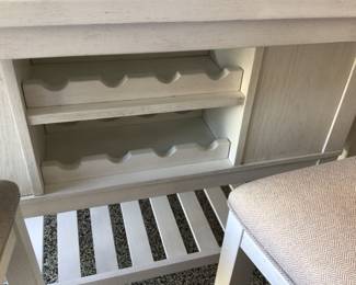 Wine rack under table