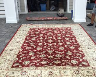 Handmade wool rug. Red and beige 9’x 12’