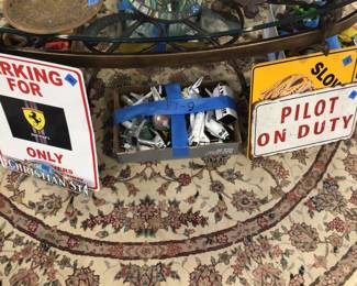 Toys, metal signs 