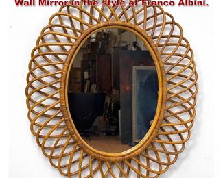 Lot 165 Italian Style Rattan and Cane Oval Wall Mirror in the style of Franco Albini.