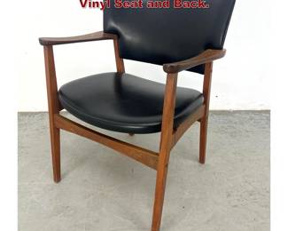 Lot 459 MCM Danish Teak Arm Chair. Black Vinyl Seat and Back. 