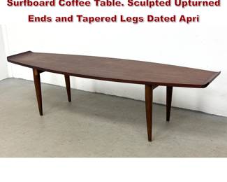 Lot 189 MidCentury Modern Walnut Surfboard Coffee Table. Sculpted Upturned Ends and Tapered Legs Dated Apri