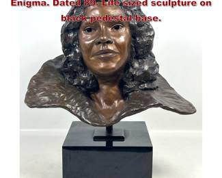 Lot 19 J. Kimmel Bronze Portrait Bust titled Enigma. Dated 89. Life sized sculpture on black pedestal base.