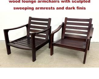 Lot 504 Pair mid century modern slatted wood lounge armchairs with sculpted sweeping armrests and dark finis