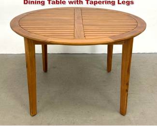 Lot 390 Article Round Teak Outdoor Slatted Dining Table with Tapering Legs 