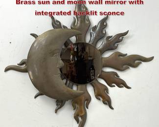 Lot 437 Vintage Brutalist style patinated Brass sun and moon wall mirror with integrated backlit sconce
