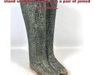 Lot 39 Large ceramic floor vase umbrella stand sculpture formed as a pair of joined rain boots.