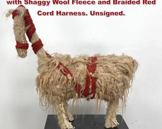 Lot 47 Hand Woven Textile Llama Sculpture with Shaggy Wool Fleece and Braided Red Cord Harness. Unsigned.
