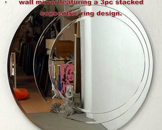Lot 411 Large tiered circular beveled glass wall mirror featuring a 3pc stacked concentric ring design.