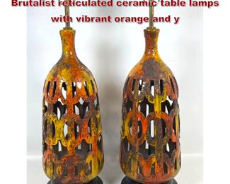 Lot 551 Pair of large Mid Century Modern Brutalist reticulated ceramic table lamps with vibrant orange and y
