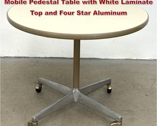 Lot 556 George Nelson for Herman Miller Mobile Pedestal Table with White Laminate Top and Four Star Aluminum
