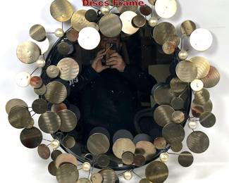 Lot 434 Jere Style Wall Mirror with Round Discs Frame. 