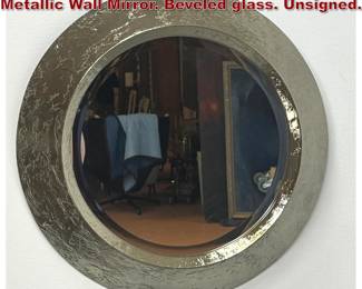 Lot 133 Round Brutalist Style Textured Metallic Wall Mirror. Beveled glass. Unsigned.