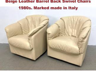 Lot 539 Pair Natuzzi Italian Post Modern Beige Leather Barrel Back Swivel Chairs 1980s. Marked made in Italy