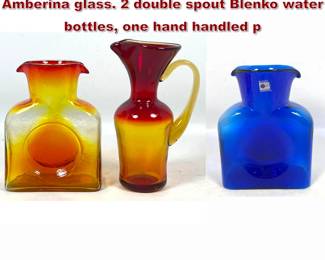 Lot 1035 3pc Art Glass lot. Tangerine Amberina glass. 2 double spout Blenko water bottles, one hand handled p