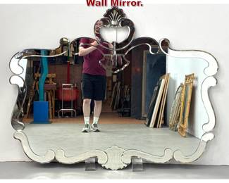Lot 837 Large Venetian Style Beveled Glass Wall Mirror. 