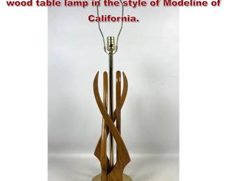 Lot 1140 MidCentury Modern sculptural wood table lamp in the style of Modeline of California. 