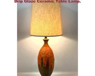 Lot 825 Mid Century Modern Orange Lava Drip Glaze Ceramic Table Lamp. 