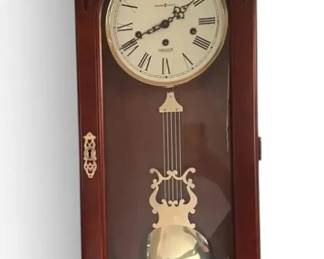 Howard Miller Cherry Finish Wall Clock