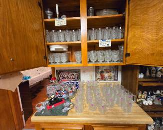 Large and small peanut butter, glass and McDonald’s Batman glasses