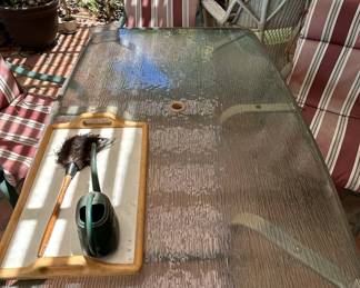 Patio Dining Set with Glass Top Table and Striped Cushioned Chairs second image