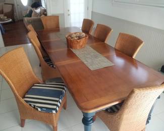 Large dining table shown with two leaves seats 8