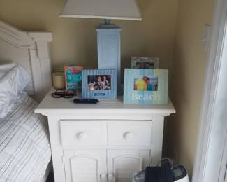 King bedroom suite: nightstand; table lamp