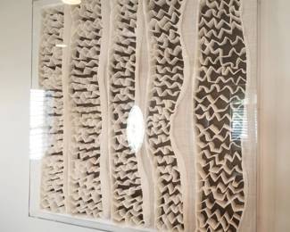 Large sculptural art under plexiglas