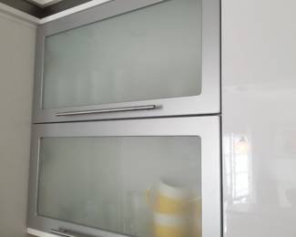 Kitchen cabinetry detail: frosted glass cabinets