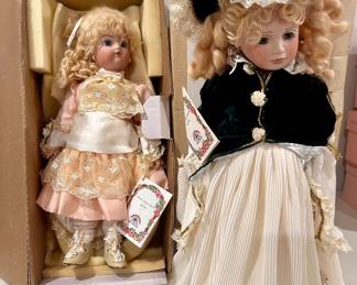 Pair of dolls w/ American Artists Collection by Kais, Inc. tags